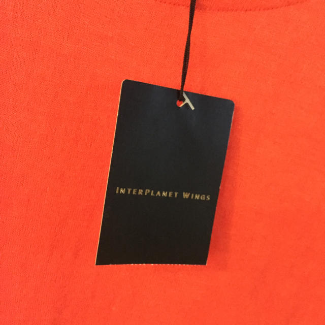 INTERPLANET(インタープラネット)のタグ付未使用 オレンジカットソー レディースのトップス(Tシャツ(半袖/袖なし))の商品写真
