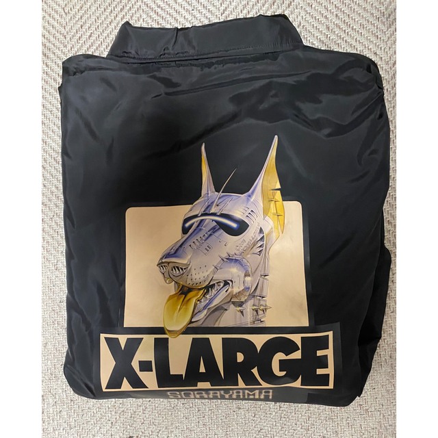 XLARGE(エクストララージ)の「XLARGE×空山基 コーチジャケットブラック｣ メンズのジャケット/アウター(ナイロンジャケット)の商品写真