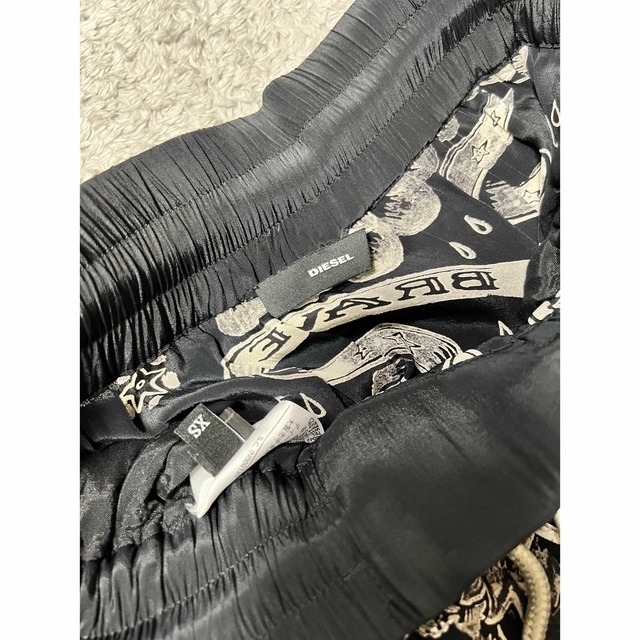 DIESEL(ディーゼル)のDIESEL ディーゼル　スカート　レディース　タトゥー レディースのスカート(ロングスカート)の商品写真