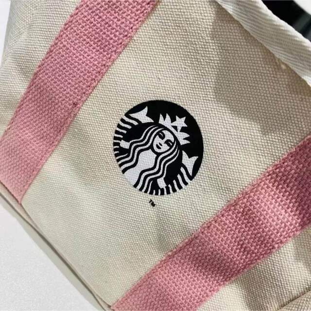 Starbucks Coffee(スターバックスコーヒー)のスタバ海外限定 日本未販売　桜　ピンク色お弁当トートバック　手持ち　エコバッグ  レディースのバッグ(トートバッグ)の商品写真