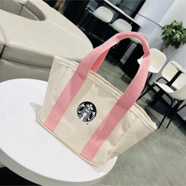 Starbucks Coffee(スターバックスコーヒー)のスタバ海外限定 日本未販売　桜　ピンク色お弁当トートバック　手持ち　エコバッグ  レディースのバッグ(トートバッグ)の商品写真