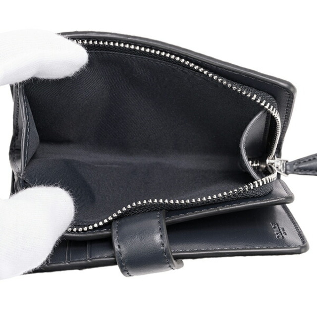 新品、未使用COACHコーチ二つ折り財布 ミッドナイトネイビー 紺 シグネチャー