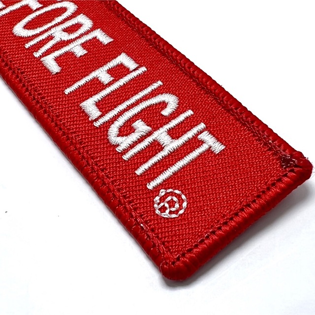 『REMOVE BEFORE FLIGHT(R)』フライトタグ キーリング エンタメ/ホビーのテーブルゲーム/ホビー(航空機)の商品写真