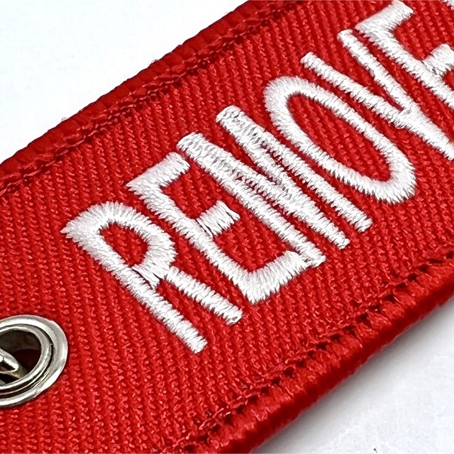 『REMOVE BEFORE FLIGHT(R)』フライトタグ キーリング エンタメ/ホビーのテーブルゲーム/ホビー(航空機)の商品写真