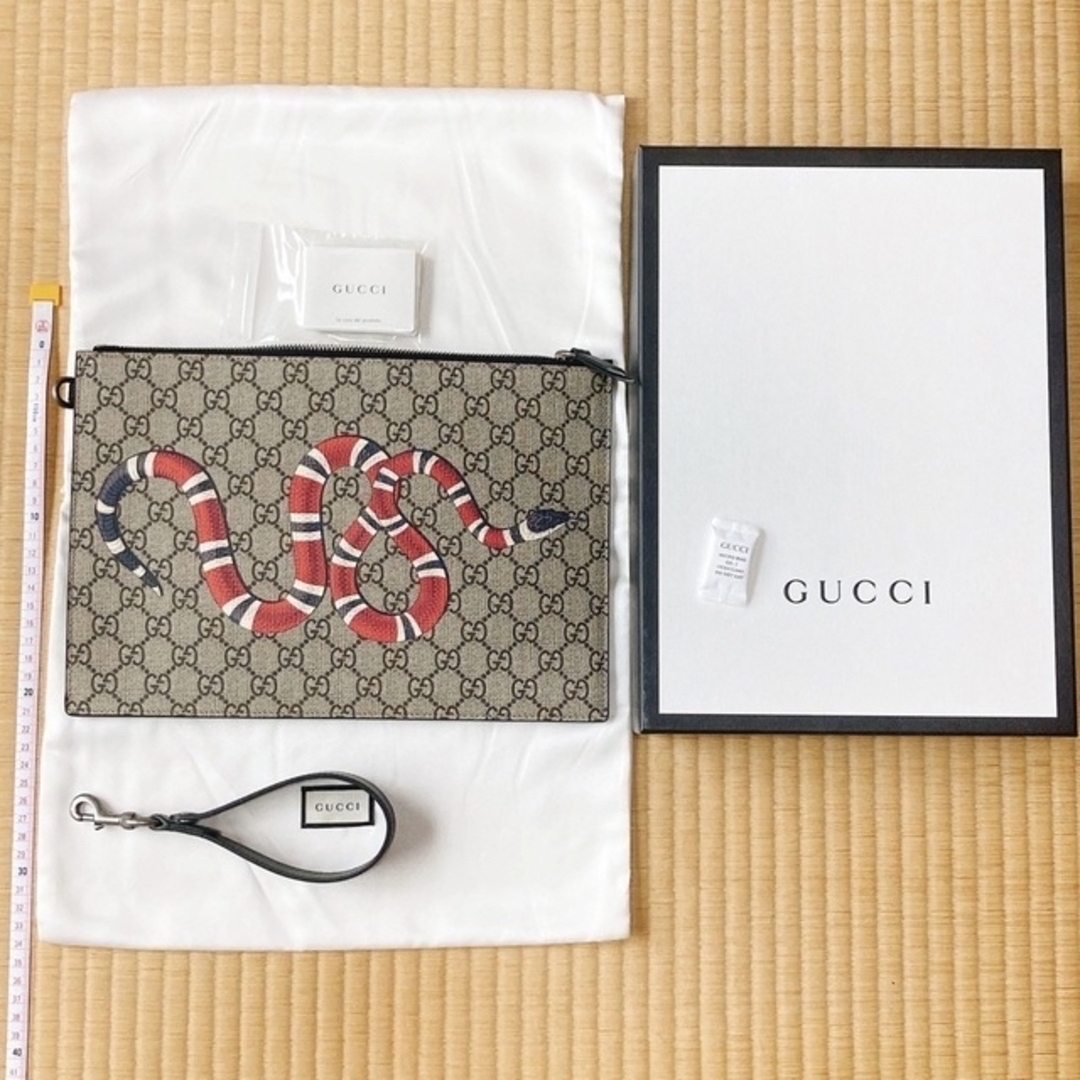 Gucci(グッチ)の箱・袋・付属品有り新品未使用！　グッチ　キングスネークGG柄クラッチバッグ メンズのバッグ(セカンドバッグ/クラッチバッグ)の商品写真