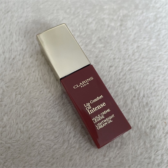 CLARINS(クラランス)のCLARINSコンフォートリップオイルインテンス01 コスメ/美容のベースメイク/化粧品(リップグロス)の商品写真