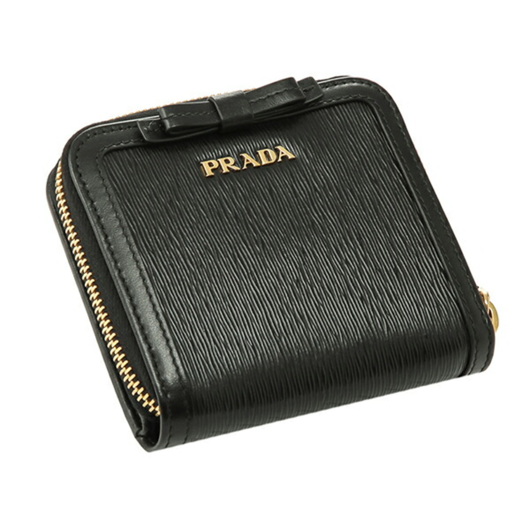 新品 プラダ PRADA 2つ折り財布 ヴィッテロ ムーヴ フィオッコ ネロ