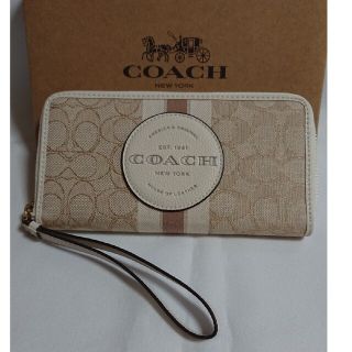 コーチ(COACH)の【チキン1515様】COACH ロゴパッチリストラップ付きスリム長財布カーキ(財布)