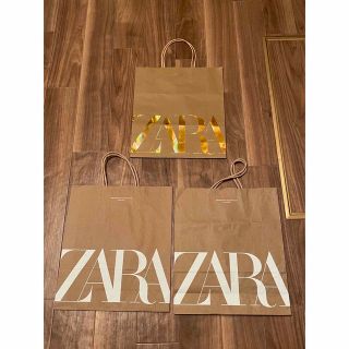 ザラ(ZARA)のZARA ザラ　紙袋 中3枚　限定金色ロゴあり 他同時購入割引します。(ショップ袋)