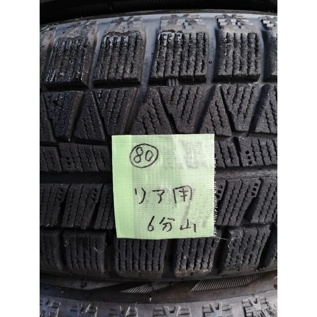 BRIDGESTONE(ブリヂストン)の80中古ブリヂストンブリザックREVOGZ　155/65R14　スタッドレス4本 自動車/バイクの自動車(タイヤ)の商品写真