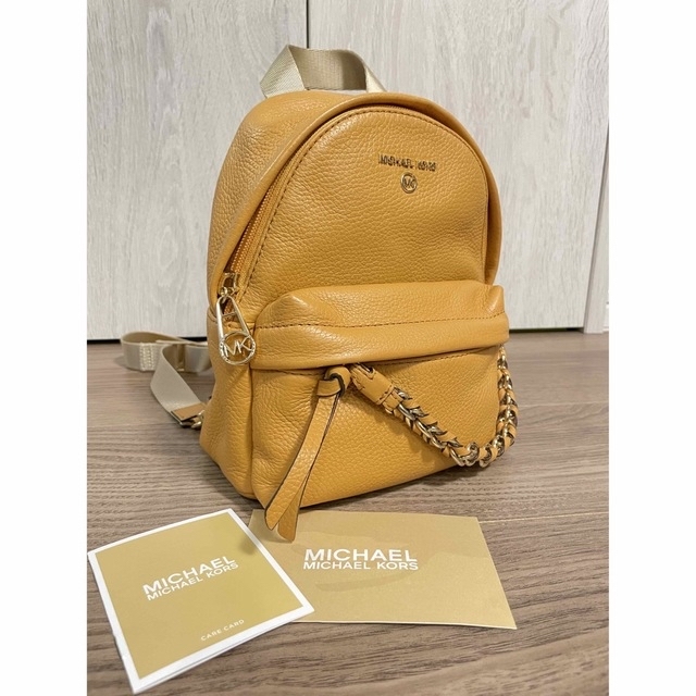 Michael Kors(マイケルコース)の【値下げ】MICHAEL KORS ミニ バックパック リュック キャメル レディースのバッグ(リュック/バックパック)の商品写真