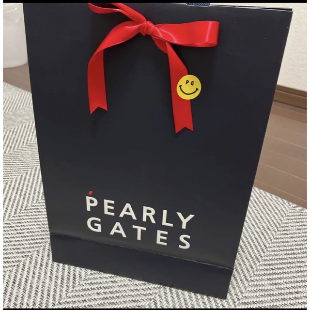 PEARLY GATES(パーリーゲイツ)のL様専用　可愛いニコちゃんシール付きリボン　ギフト用 スポーツ/アウトドアのゴルフ(バッグ)の商品写真