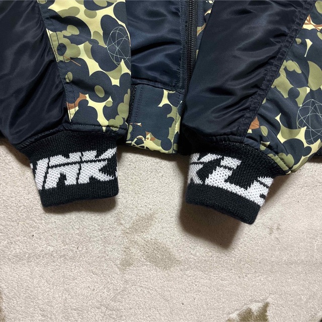 A BATHING APE(アベイシングエイプ)のAPE  BAPE  KAWS UNKLE MA-1 FUTURA ジャケット メンズのジャケット/アウター(ミリタリージャケット)の商品写真