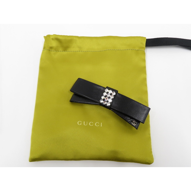 Gucci(グッチ)のGUCCI バレッタ インターロッキングG リボンモチーフ ブラック レザー レディースのヘアアクセサリー(バレッタ/ヘアクリップ)の商品写真