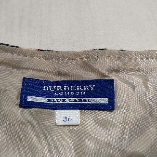 BURBERRY BLUE LABEL(バーバリーブルーレーベル)のバーバリー　ブルーレーベル　巻き　スカート　ベージュ　チェック レディースのスカート(ひざ丈スカート)の商品写真