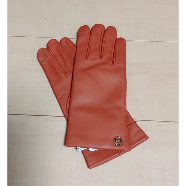 COACH(コーチ)の【新品タグ付き】COACH レザーグローブ　18cm オレンジ レディースのファッション小物(手袋)の商品写真