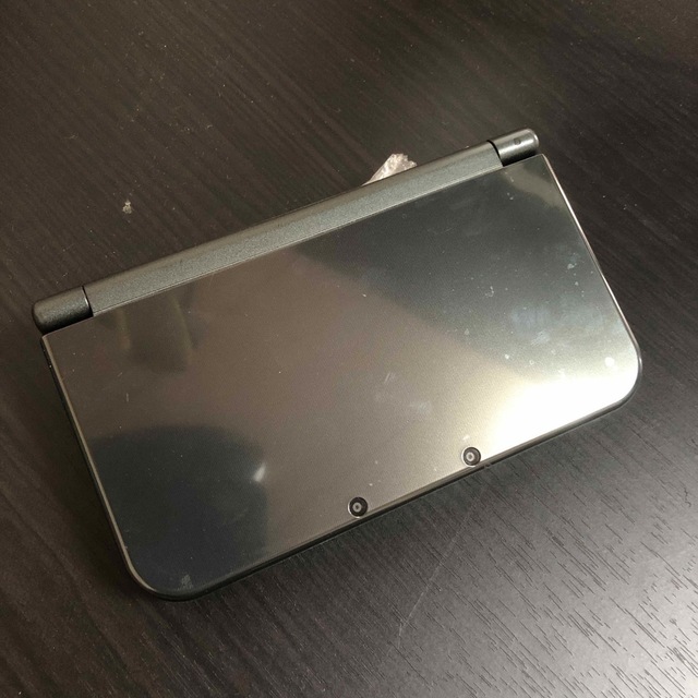 ニンテンドー3DS(ニンテンドー3DS)のNewニンテンドー3DS LL メタリックブラック　動作品　ケース付き エンタメ/ホビーのゲームソフト/ゲーム機本体(携帯用ゲーム機本体)の商品写真