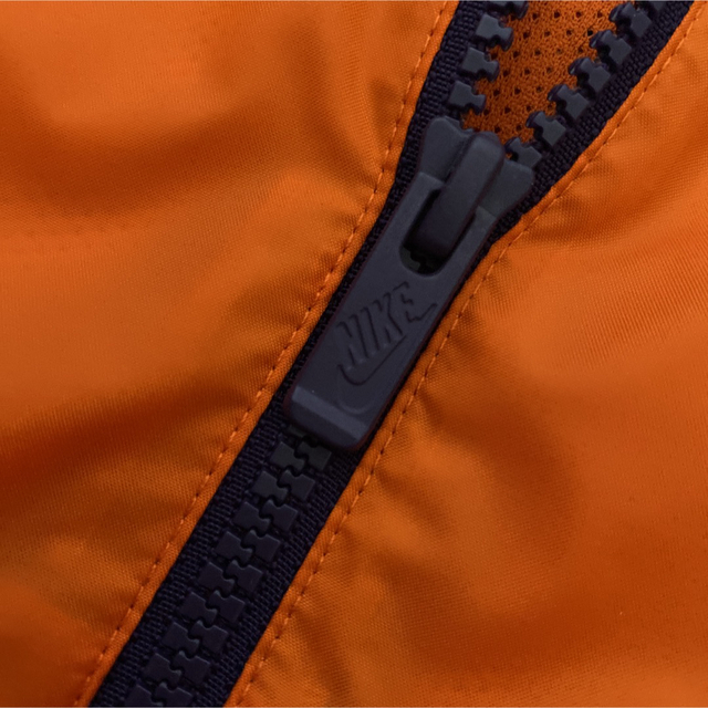NIKE(ナイキ)のNIKE ナイキ ウィンドランナー フード ジャケット オレンジ/パープル メンズのジャケット/アウター(ナイロンジャケット)の商品写真
