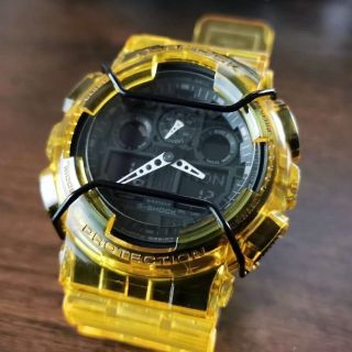 カシオ(CASIO)のG-SHOCK GA-100 [スケルトンイエロー] + メタル遊環 + ガード(腕時計(アナログ))