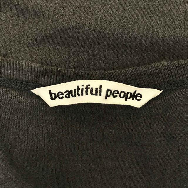 beautiful people(ビューティフルピープル)のbeautiful people / ビューティフルピープル | コットン プリント ロングテール Tシャツ  | 36 | ブラック | レディース レディースのトップス(Tシャツ(半袖/袖なし))の商品写真