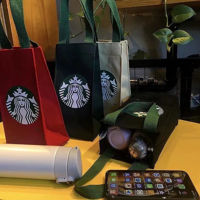 Starbucks(スターバックス)のスタバ海外限定 日本未販売ドリンク小物入れ　スナップ式　ベージュ　クリーム色 レディースのバッグ(トートバッグ)の商品写真