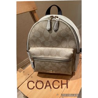 コーチ(COACH)のCOACH コーチ　ミニリュック　ベージュ　総柄チャーム付き　F58315(リュック/バックパック)