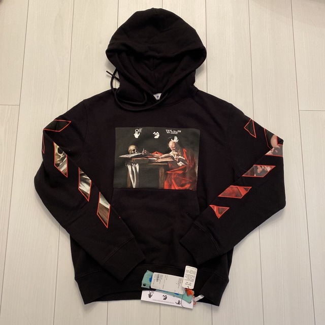 新発売 CARAVAGGIO OFF-WHITE - OFF-WHITE OVER 新品未使用 HOODIE