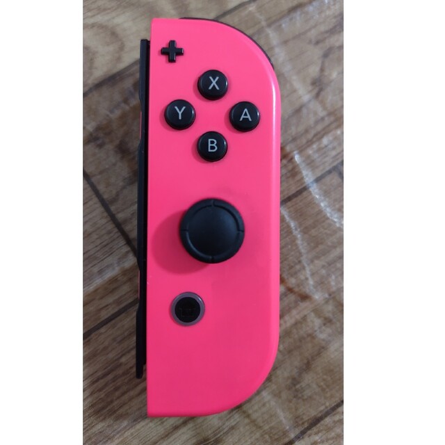 Nintendo Switch(ニンテンドースイッチ)のSwitch ジョイコン ピンク 右 ジャンク エンタメ/ホビーのゲームソフト/ゲーム機本体(その他)の商品写真