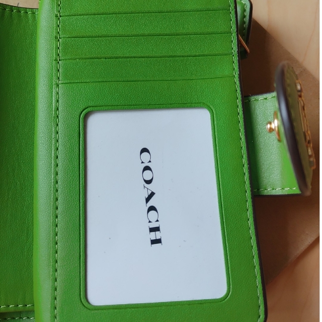 COACH コーチ　折り財布　グリーン　緑色　花柄　二つ折り財布