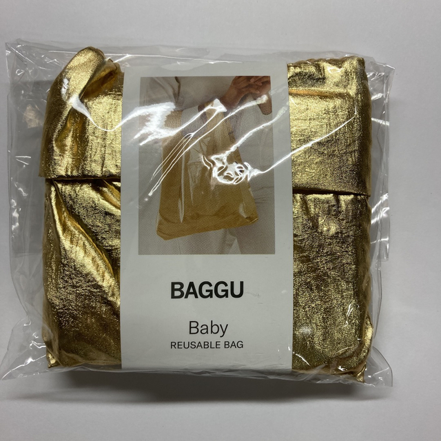 BAGGU メタリック　ゴールド　ベビーサイズ レディースのバッグ(エコバッグ)の商品写真