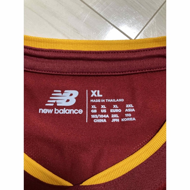 New Balance(ニューバランス)の【新品タグ付き】ASローマ22-23ホームエリートユニフォーム22番ザニオーロ スポーツ/アウトドアのサッカー/フットサル(ウェア)の商品写真