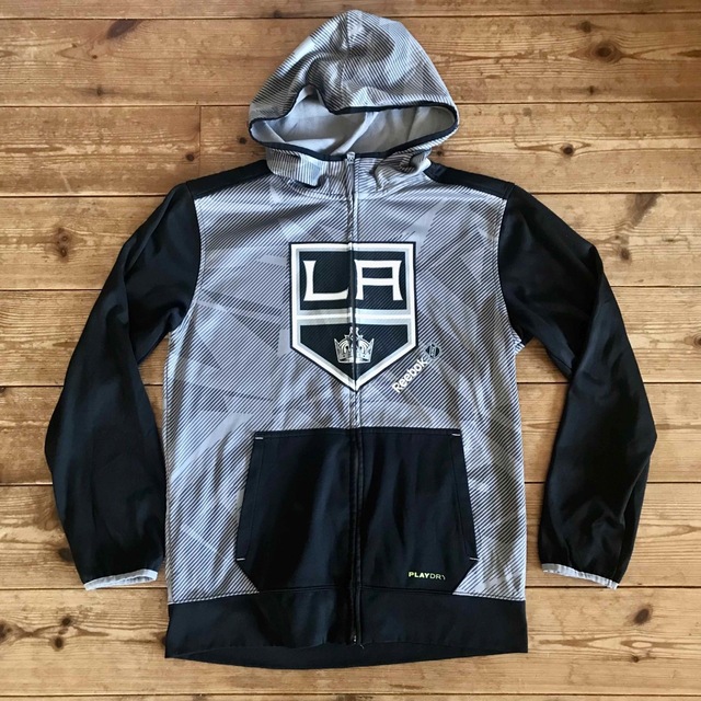 Reebok(リーボック)のNHL アイスホッケー　ロサンゼルス　キングス　裏起毛トリコットフードジャケット スポーツ/アウトドアのスポーツ/アウトドア その他(ウインタースポーツ)の商品写真