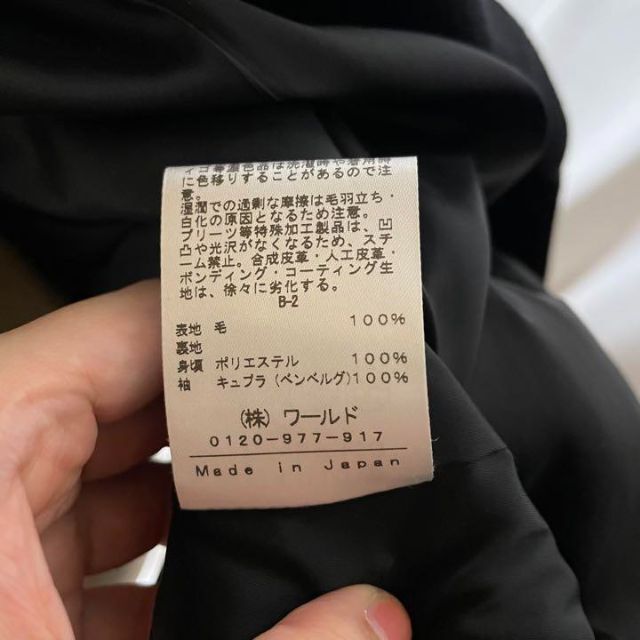 ワールド シンプル ブラック ロングコート 通勤 OL カジュアル レディースのジャケット/アウター(ロングコート)の商品写真
