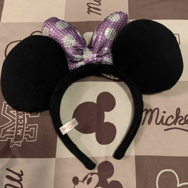 Disney(ディズニー)のミニーちゃん　カチューシャ紫 エンタメ/ホビーのおもちゃ/ぬいぐるみ(キャラクターグッズ)の商品写真
