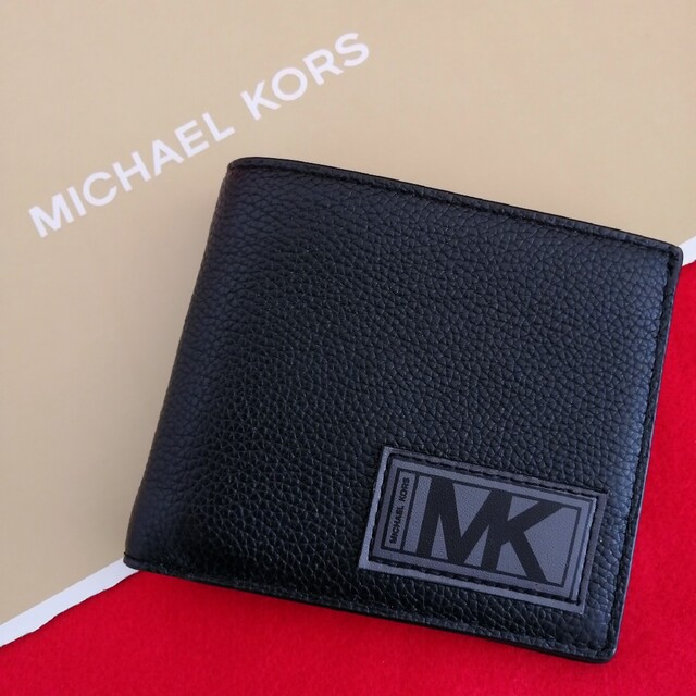 Michael Kors(マイケルコース)の【新品未使用】マイケルコース　折財布　ブラック メンズのファッション小物(折り財布)の商品写真