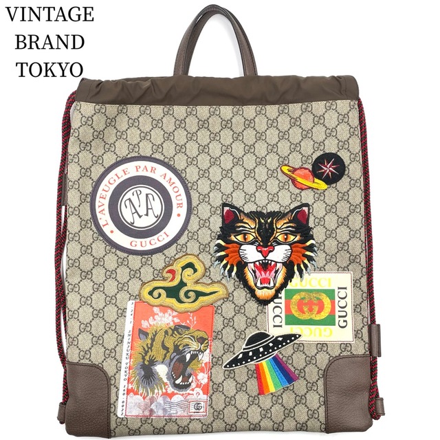割引購入 Gucci - 美品【中古品】 ギフト メンズ アンティークゴールド金具 茶 ブラウン ベージュ GGスプリームキャンバス 473872 鞄 かばん A4対応 アングリーキャット ワッペン バックパック ドローストリング クーリエ リュック グッチ GUCCI バッグパック+リュック