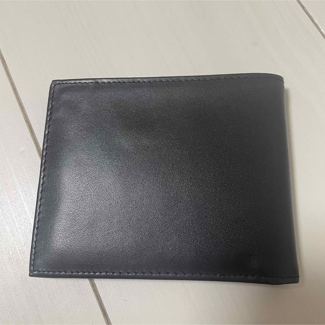 SWAROVSKI(スワロフスキー)のSWAROVSKI スワロフスキー　二つ折り財布　お札入れブラック レディースのファッション小物(財布)の商品写真
