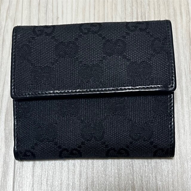 Gucci(グッチ)のグッチ　GUCCI 二つ折り財布　黒　GGキャンバス　Wホック レディースのファッション小物(財布)の商品写真