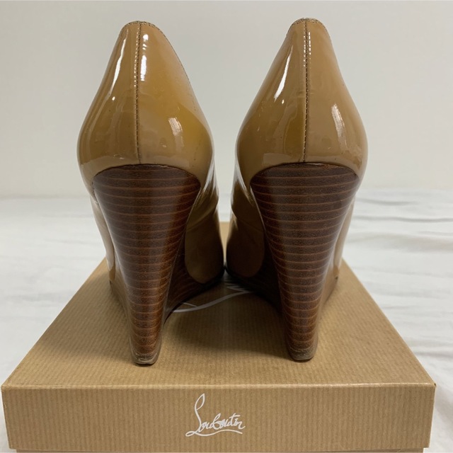 Christian Louboutin(クリスチャンルブタン)のクリスチャンルブタン エナメル ウェッジ ソール パンプス 36 1/2 レディースの靴/シューズ(ハイヒール/パンプス)の商品写真