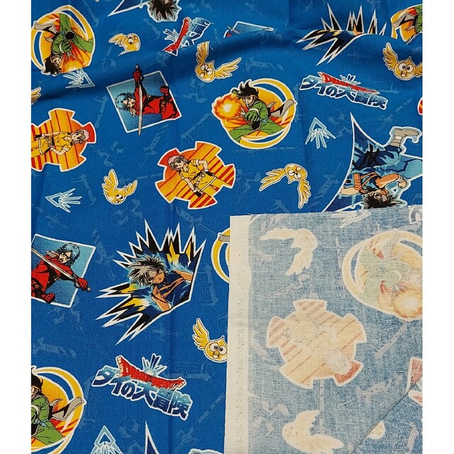 12 ダイの大冒険　オックス生地　濃い青色地　110×50cm ハンドメイドの素材/材料(生地/糸)の商品写真