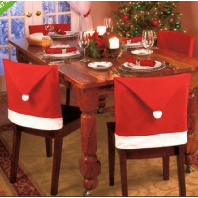 クリスマス　椅子カバー　４枚セット サンタクロース帽子　チェアーカバー パーティ インテリア/住まい/日用品の椅子/チェア(その他)の商品写真