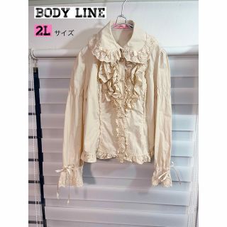 ボディライン(BODYLINE)の【未使用】BODY LINE ハート　リボン　フリル　ブラウス　ベージュ(シャツ/ブラウス(長袖/七分))