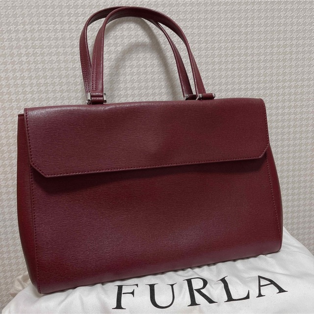 Furla(フルラ)の専用☆フルラ　FURLA ☆バッグ　濃ピンク　袋付き レディースのバッグ(ハンドバッグ)の商品写真