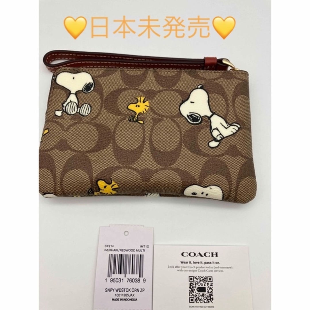 COACH(コーチ)のCOACH （CF214） シグネチャー スヌーピー リストレット レディースのファッション小物(ポーチ)の商品写真