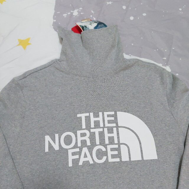 THE NORTH FACE(ザノースフェイス)の新品、未使用)ノースフェイスタートルMサイズ(90 レディースのトップス(その他)の商品写真