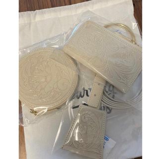 GRACE CONTINENTAL - carving tribes キカマルチバッグ&モバイルケース
