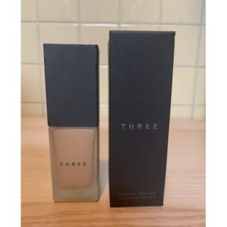 スリー(THREE)のTHREE フローレスエシリアル フルイド ファンデーション 100番 30ml(ファンデーション)