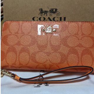 コーチ(COACH)のCOACH  長財布　シグネチャー　オレンジ(財布)