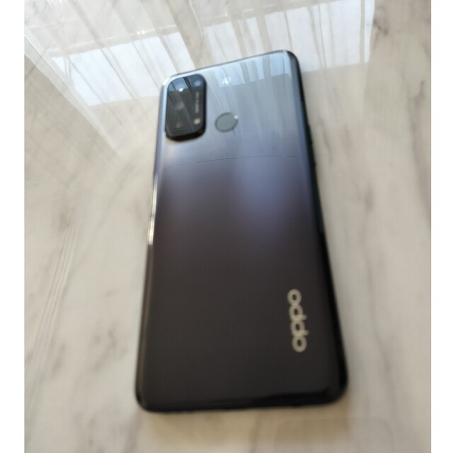 OPPO(オッポ)のOPPO Reno5A　本体　シルバーブラックオッ　ポ スマホ/家電/カメラのスマートフォン/携帯電話(スマートフォン本体)の商品写真