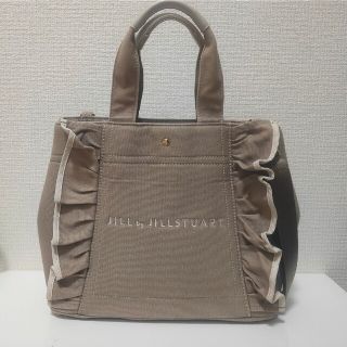 ジルスチュアート(JILLSTUART)のフリルトートバッグ(大) FR モカグレー(トートバッグ)